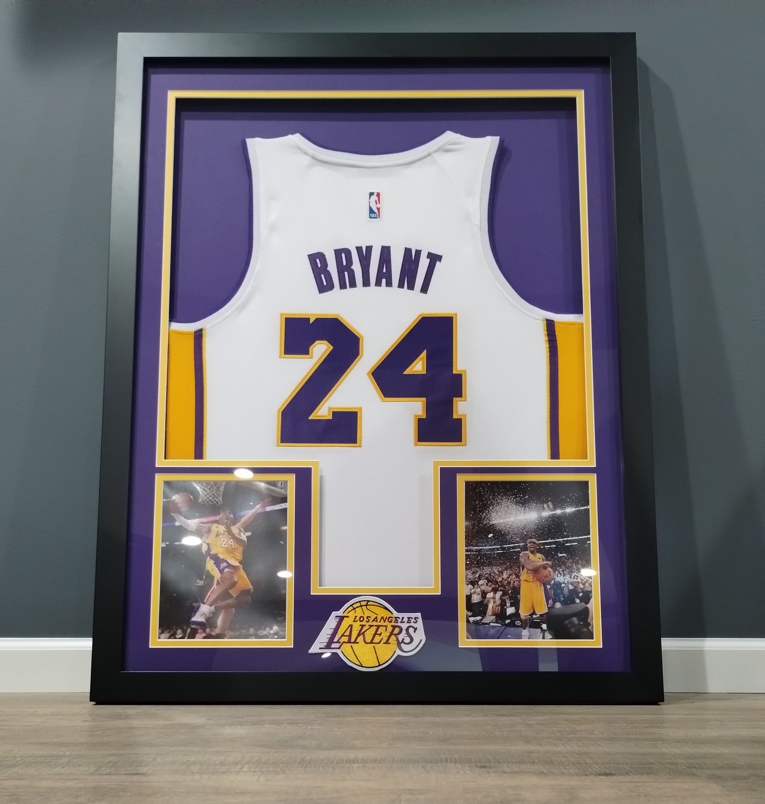 Framed White Kobe Bryant #24 Lakers Jersey (UNSIGNED) –